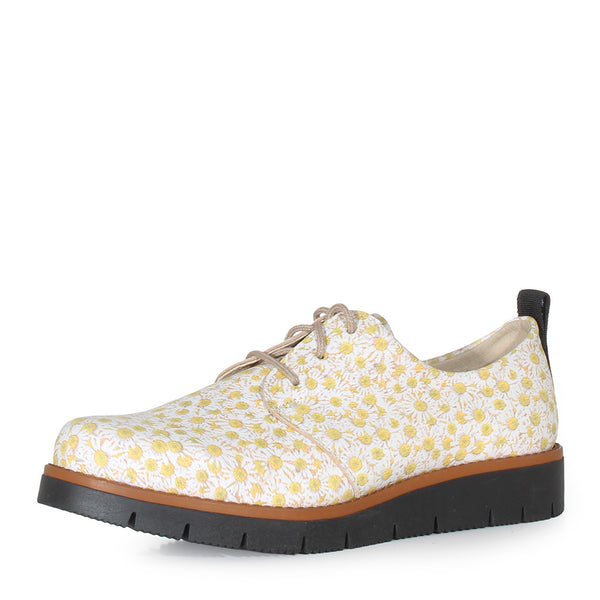 Martino Zina lace-up shoe in a white and yellow daisy pattern.